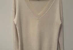 Thin white sweater