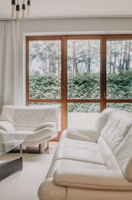 Meble skórzane Kler - sofa, dwa fotele i podnóżek w kolorze kremowym-2