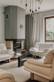 Meble skórzane Kler - sofa, dwa fotele i podnóżek w kolorze kremowym-3
