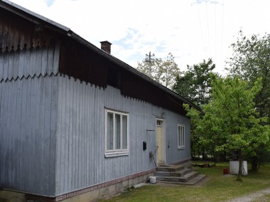 Dom drewniany 100m2 na działce 18a- Trześniów-1