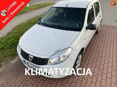 Dacia Sandero I Benzyna, niski przebieg, klimatyzacja, centr. zamek, isofix, 2 kpl.k-1