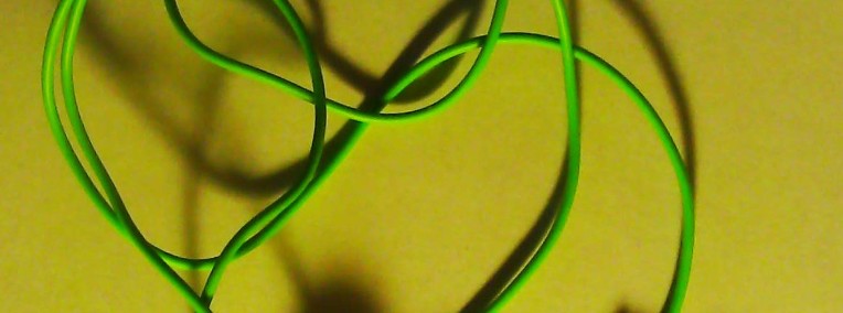 Słuchawka douszna, na zielonym 80 cm kabelku, działająca;-1