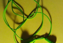 Słuchawka douszna, na zielonym 80 cm kabelku, działająca;