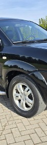 Hyundai Tucson 2,0Benzyna( DOHC ) Skóry.Serwis.Hak.Parktronic.Tempomat.Klimatronic-4