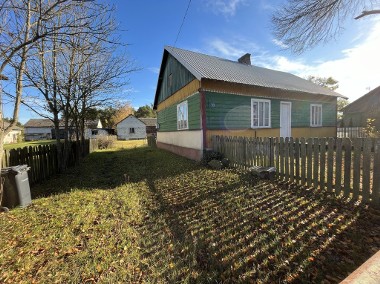 Dom z drewna na działce w Woli Chodkowskiej-1