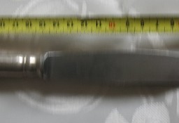 Nóż z nierdzewnej stali, trzonek posrebrzany, sygnowany Bubela C&K