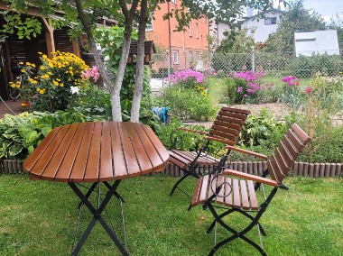 Drewniano-metalowy stół ogrodowy z zestawem sześciu krzeseł-1