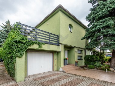 Dom mieszkalno-usługowo-inwestycyjny, Podolany-1