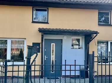 Mieszkanie z ogórdkiem i garażem niedaleko Bobolic-1