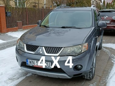 Mitsubishi Outlander II 2.4 MIVEC Instyle,4WD, 170KM, automat, skóra, 7-osobowy-1