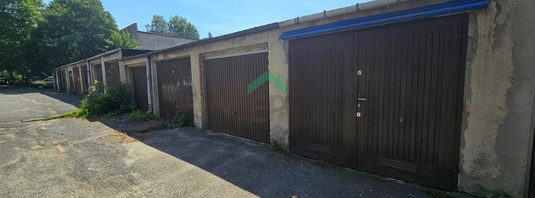 Murowany garaż z kanałem / TYSIĄCLECIE-1