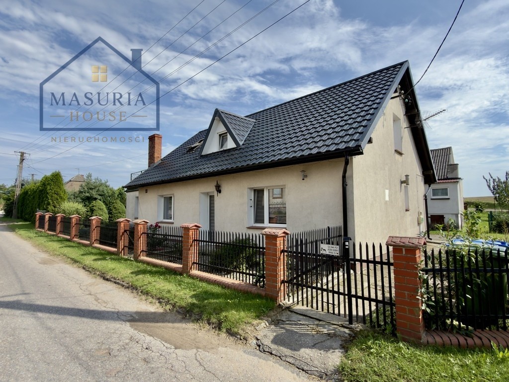 Dom z trzema garażami i letnią kuchnią po remoncie