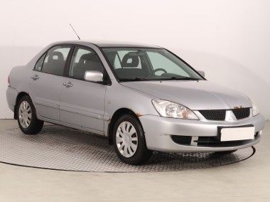 Mitsubishi Lancer VII , Salon Polska, Klima, El. szyby, Alarm-1