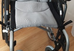 Nowy, składany wózek  inwalidzki z aluminium + poduszka przeciwodleżynowa