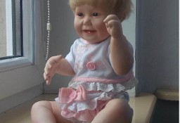 Porcelanowa lalka kolekcjonerska sygnowana