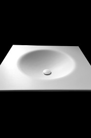 Owalna umywalka łazienkowa wygięta bezpośrednio z blatu o wymiarze 60x55x1.2cm-2