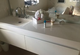 Umywalki na wymiar - nowoczesne wyposażenie łazienek z Corianu LUXUM