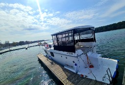 Wynajem łodzi motorowej bez patentu Hauseboat Mikołajki na Mazurach 