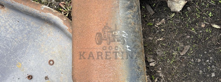 New Holland T8 - wspornik kolano tłumika 87588160-1