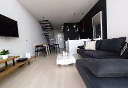 Dwupoziomowy apartament w sercu Mokotowa