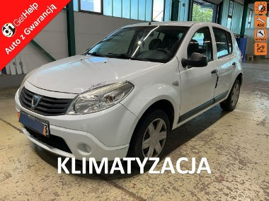 Dacia Sandero I Benzyna, niski przebieg, klimatyzacja, el. szyby, isofix, oszczedny-1