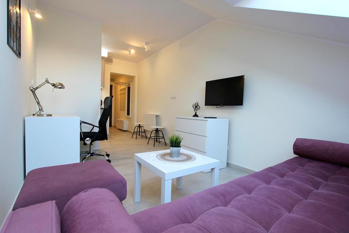Elegancka kawalerka w nowym budynku z windą i ochroną - blisko CENTRUM