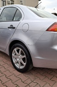 Mitsubishi Lancer VIII Zarejestrowany i Ubezpieczony. Oryginalny Przebieg. Serwisowany.-2