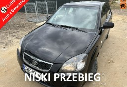 Kia Rio II Benzyna, klimatyzacja, opony wielosezonowe, isofix, el.szyby, 8 airb