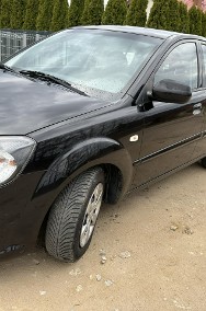 Kia Rio II Benzyna, klimatyzacja, opony wielosezonowe, isofix, el.szyby, 8 airb-2