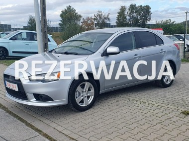 Mitsubishi Lancer VIII Niski przebieg/Serwis w ASO/Czujniki parkowania/Alufelgi-1