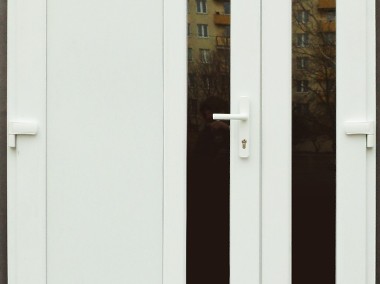 nowe PCV drzwi 130x210 białe, długa szyba, dobrej jakości-1
