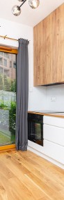 Nowe studio z ogródkiem | Apartamenty Novum

 -3