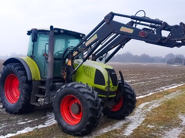 Ciągnik rolniczy Claas Ares 697 ATZ z  ładowaczem czołowym turem Stoll Robust F-1