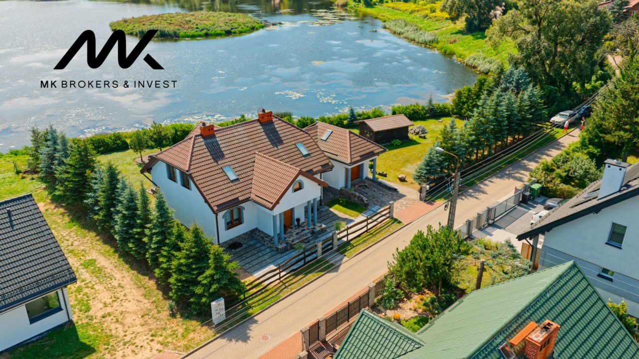 DOM Z LINIĄ BRZEGOWĄ ZALEWU | GOŁDAP | 222 m²