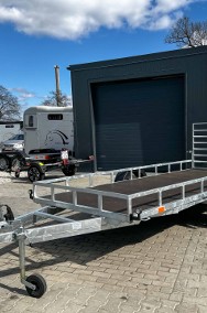 PRZYCZEPA PLATFORMOWA NOWIM 1300 KG – 4,2 × 1,5 M, RELING, TRAP WJAZDOWY-2