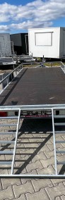 PRZYCZEPA PLATFORMOWA NOWIM 1300 KG – 4,2 × 1,5 M, RELING, TRAP WJAZDOWY-4