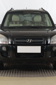 Hyundai Tucson , Klimatronic, Tempomat, Parktronic, Podgrzewane siedzienia,-2