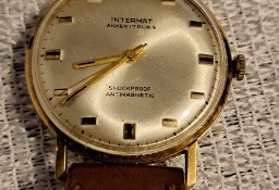 Złoty zegarek Intermat,  próba 585 . Sprawny 