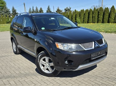Mitsubishi Outlander II 2,4Benz Serwis-Full.Alcantara.Klimatyzacja.El.szyby.Centralka.Hak-1