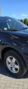 Mitsubishi Outlander II 2,4Benz Serwis-Full.Alcantara.Klimatyzacja.El.szyby.Centralka.Hak-4