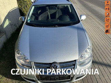 Volkswagen Golf V 1,9 TDi,CLIMAtronic,nawigacja, podg. fotele, hak,parktronik, z Niemi-1